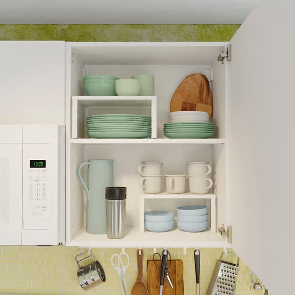 Creating extra space in kitchen cupboards