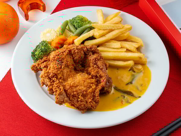 Crispy Chicken Chop With Golden Creamy Sauce, Mixed Vegetables and  Fries