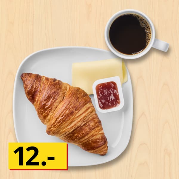 Croissant
Croissant med 1 skive ost, 1 pakke jordbærmarmelade og 1 kop kaffe eller te

12.-