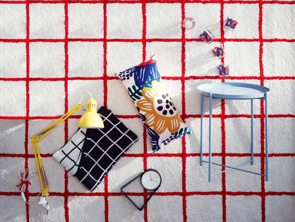 Cushion some colors, table, rug red and white. Trends Decoration 2019 IKEA