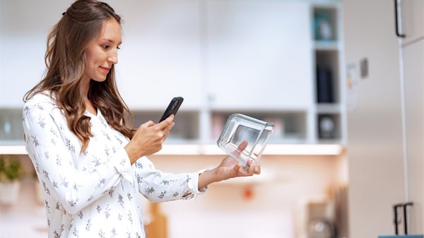 customer scans IKEA product using new Mobile Checkout feature
