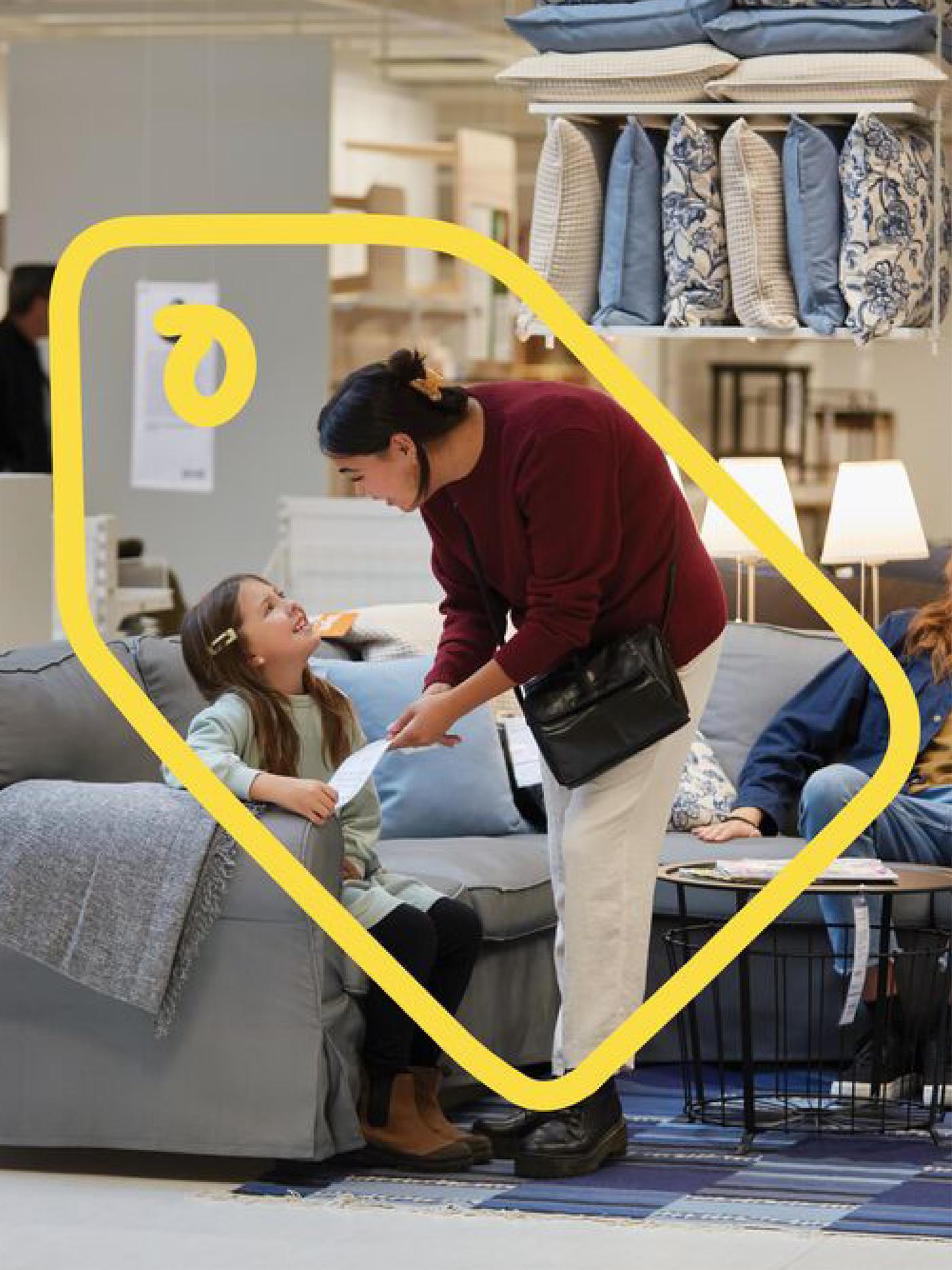 Customer shopping with their child in living rooms