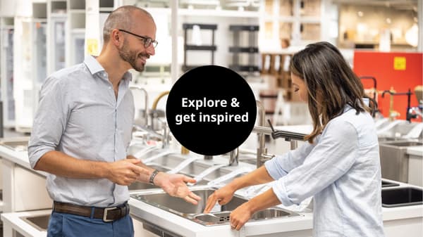 Customers choosing sinks and taps
