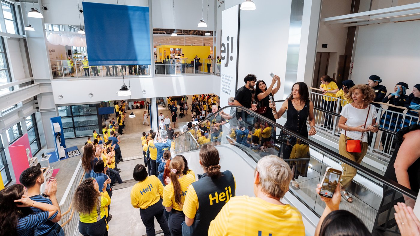 Customers going up the escalator