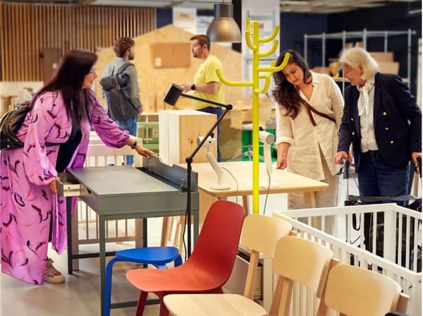 Customers in circular hub browsing furniture