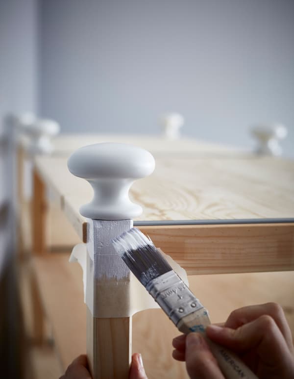Customise your IVAR shelf by adding knobs and some white paint.
