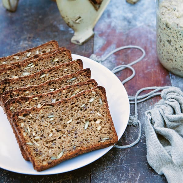 Danish rye bread on a white plate