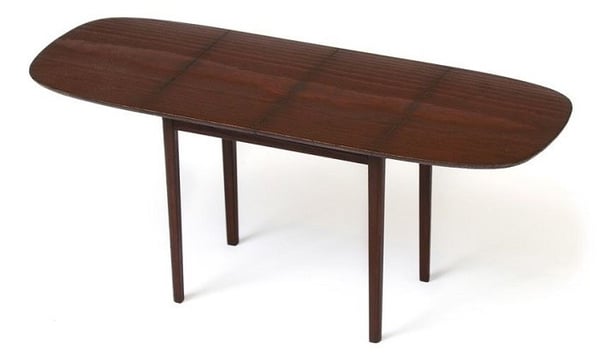 Dark brown RIGA dining table introduced to IKEA range at 1948