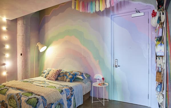 Decorate a bedroom with rainbow colours.