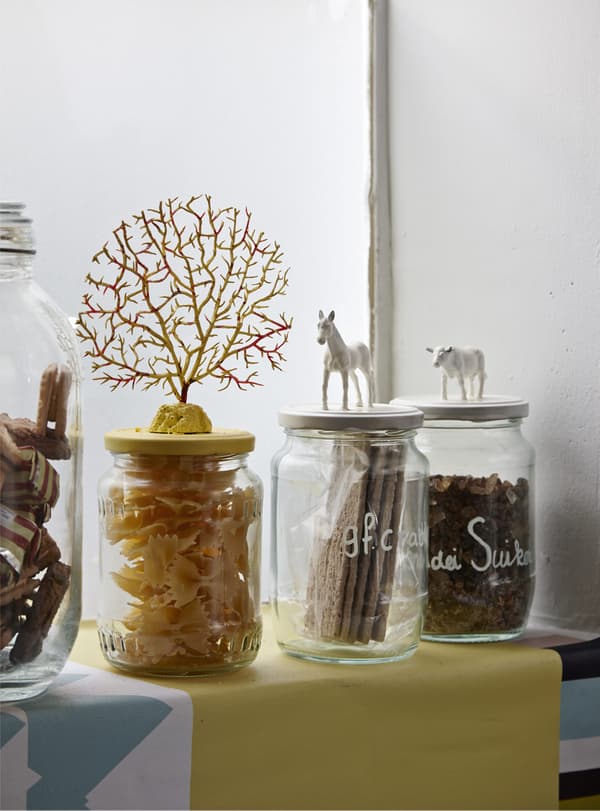 Decorated jars full of dry ingredients