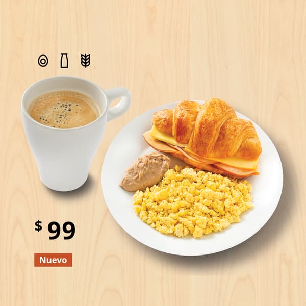 Desayuno completo con un croissant de jamón y queso, huevo revuelto y frijoles. Incluye café refill.