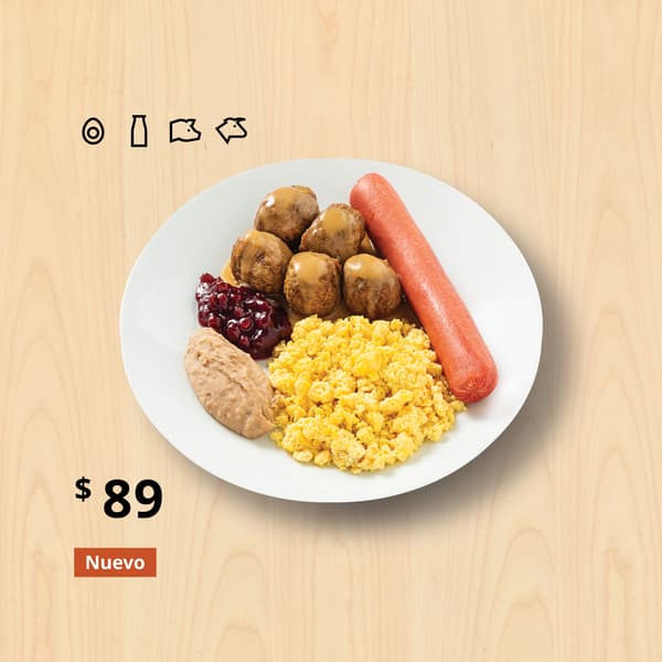 Desayuno con 5 albóndigas de carne, huevo, frijoles, salchicha, gravy y mermelada de lingonberry.