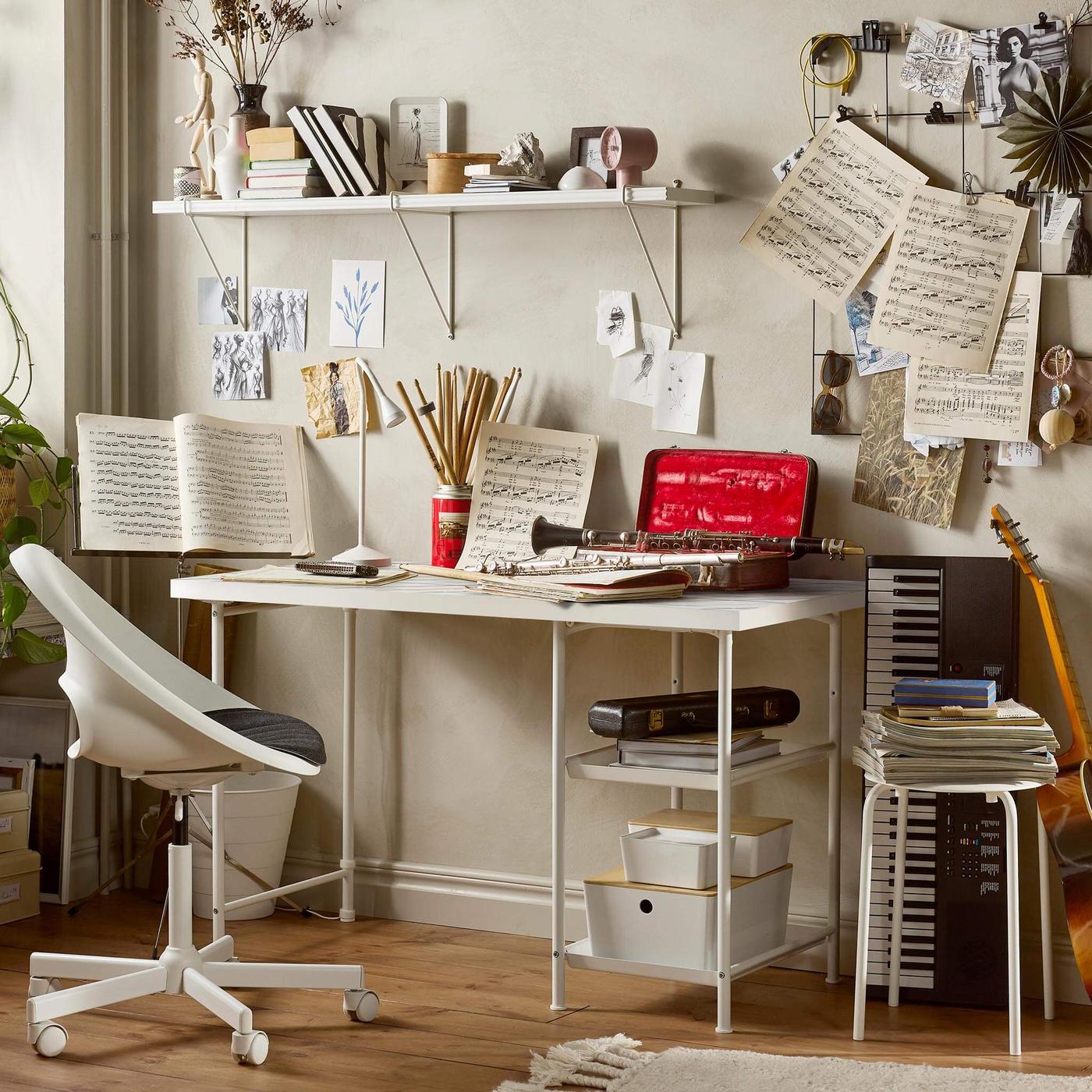 Desk and chair with papers 
