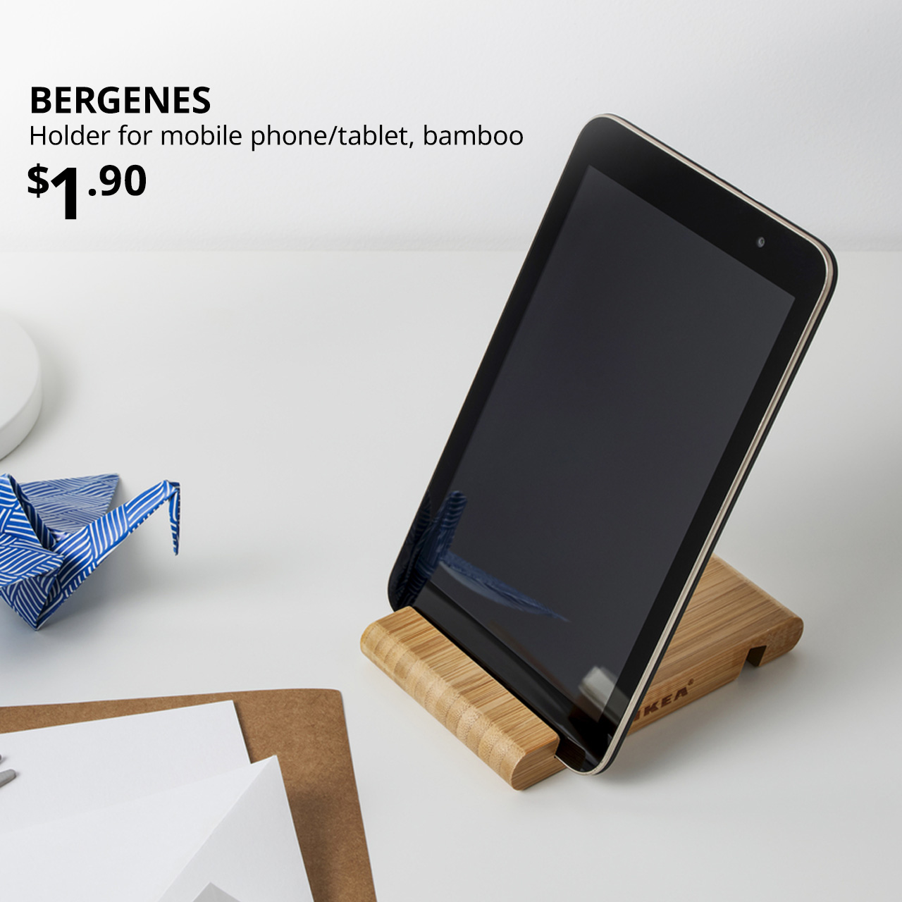 Desk featuring bamboo BERGENES holder for mobile phone/tablet. $1.90