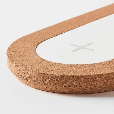 Details about the triple charging base for mobile phones.