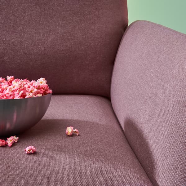 Dettaglio della poltrona reclinabile EKOLSUND con fodera asportabile e lavabile in marrone chiaro-rosa - IKEA