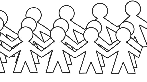 Dibuix d'un paper tallat en forma de garlandes de nens i nenes agafats de les mans.