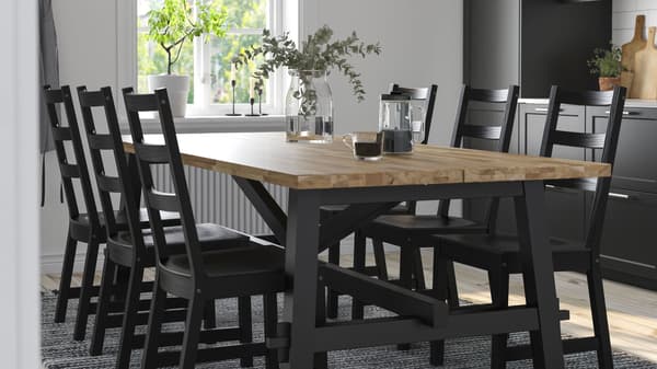 Dining room table with six chairs with a black finish