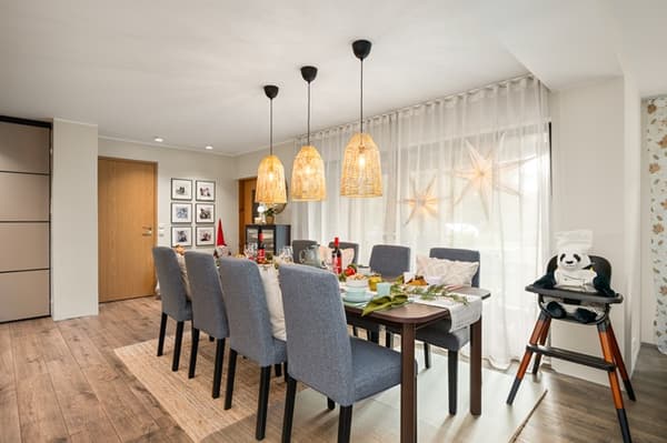 Dining table with grey stools