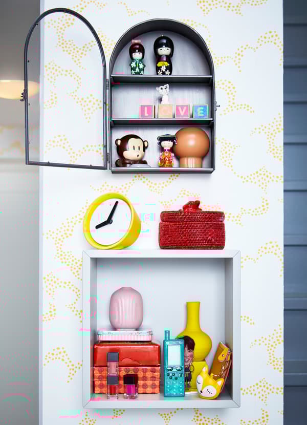 Display items you love in IKEA EKET square white open storage cabinet and BOLLEBYGD dark grey display box with three shelves and an arched glass door.