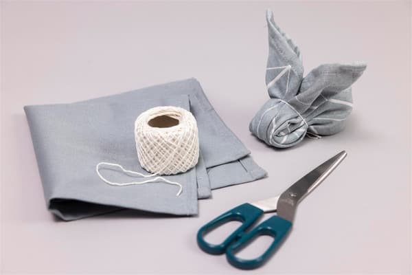 DIY napkin bunny – what you'll need: scissors, string, tea towel
