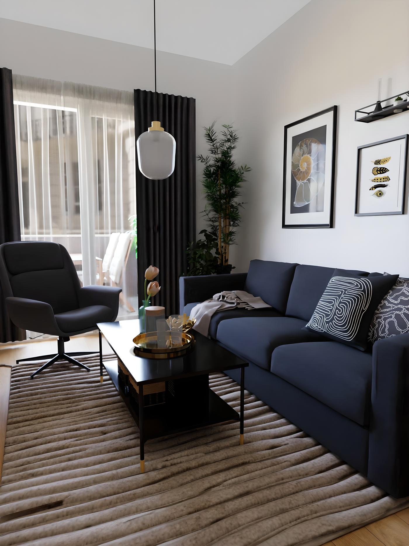 Dnevni boravak s tamnoplavim kaučem, crnom stolicom, stolićem za kavu i umjetničkim slikama na zidu.