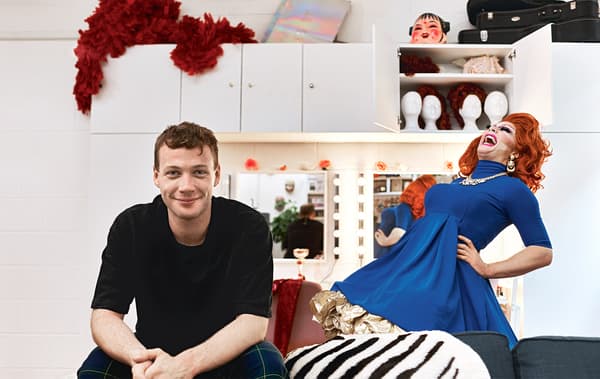 Donald seated in his studio alongside his alter ego Ginger.