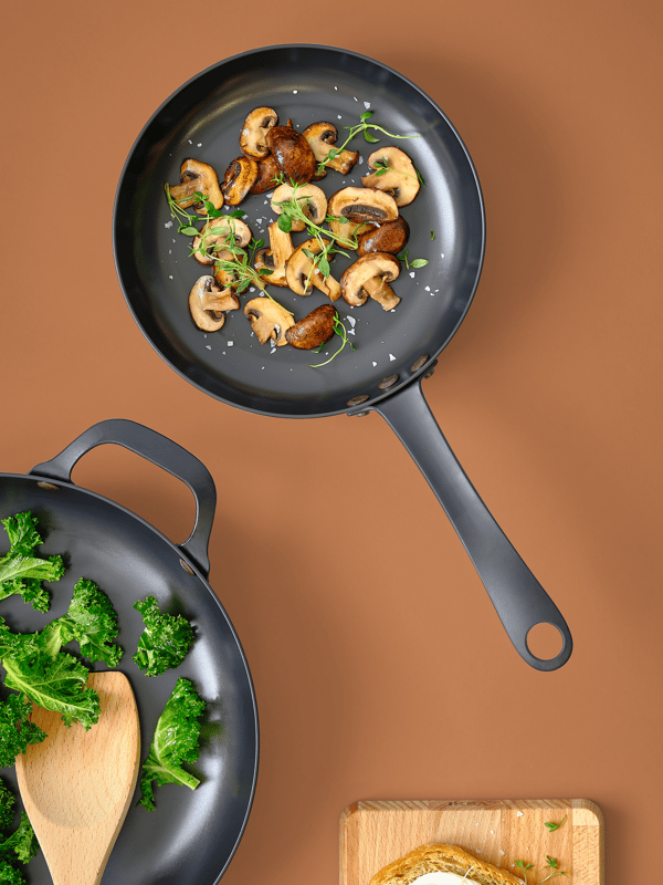 E: A skillet with a stir-fry dish on a stove, labeled “‘Everyone out of the kitchen’ Chef”