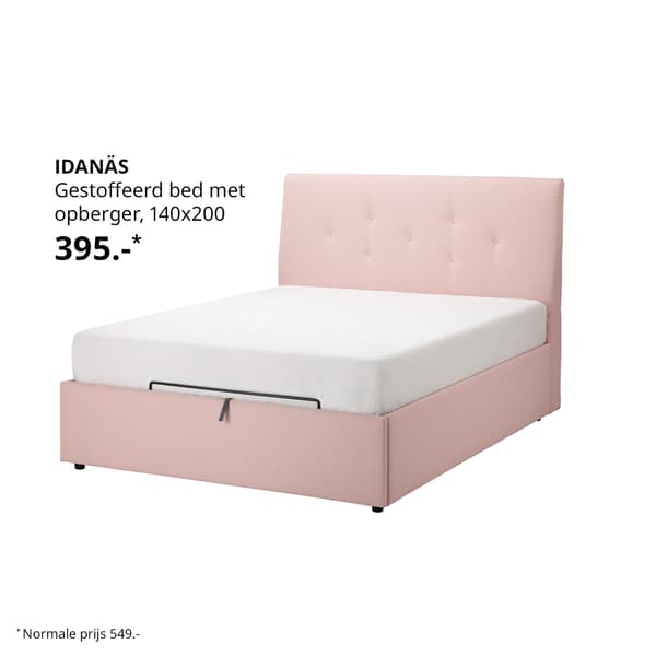 Een rozen gestoffeerd bed.