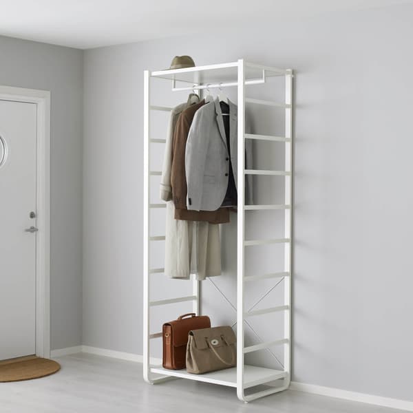 ELVARLI white system with coats hanging in it against a gray wall