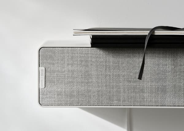 ENEBY Bluetooth speaker wall mounted against a white background.