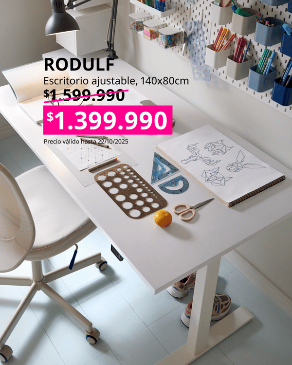 Escritorio ajustable blanco RODULF con utensilios de escritorio sobre el