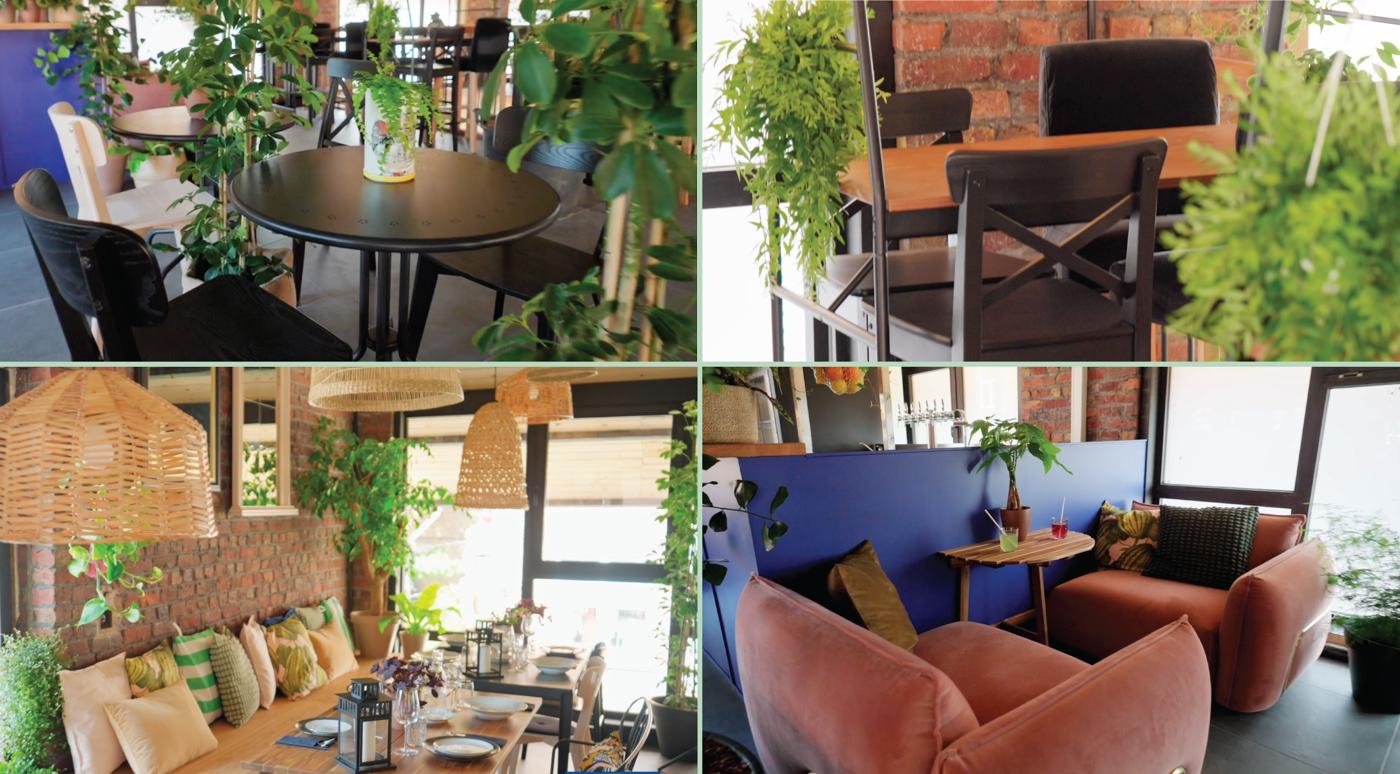 Espace restaurant avec chaise et table noire, des fauteuils en velour rose et des suspension en matériau naturel.