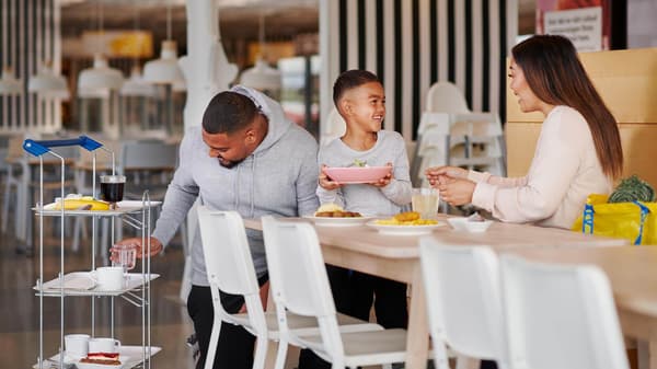 Family enjoying a meal at the IKEA restaurant