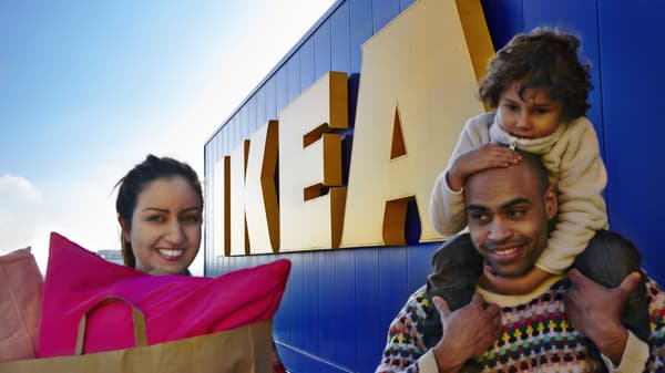 family walking in fron of an IKEA sign