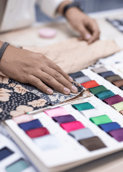 Fashioon designer selecting clothes 