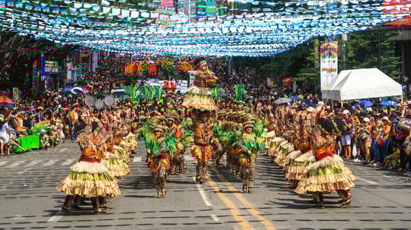 Festival Photo by Hitoshi Namura
Participants in bright, colorful costumes march in a festive parade during the Albay festival in May, celebrating the culture and traditions of Albay province in the Philippines.