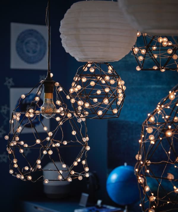 Festive lighting decoration using IKEA hanging lamps and LED strips
