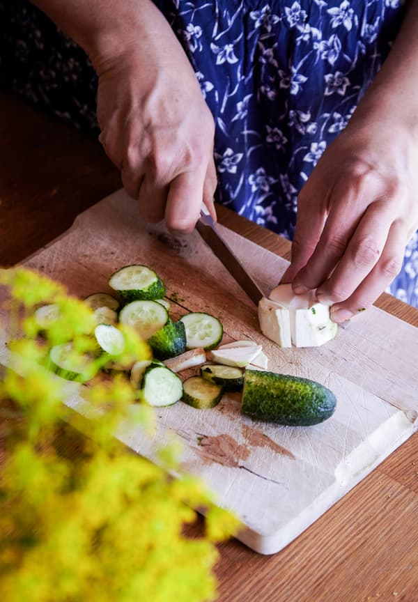Finely slice the cucumber.