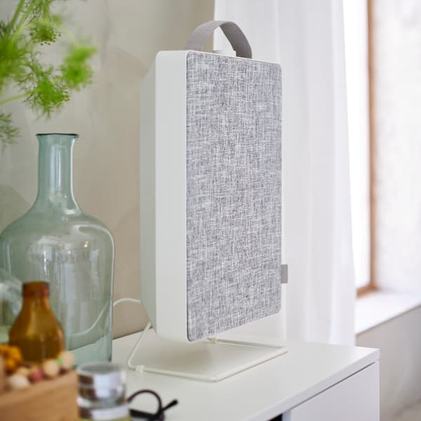 FÖRNUFTIG air purifier, sat on a chest of drawers.