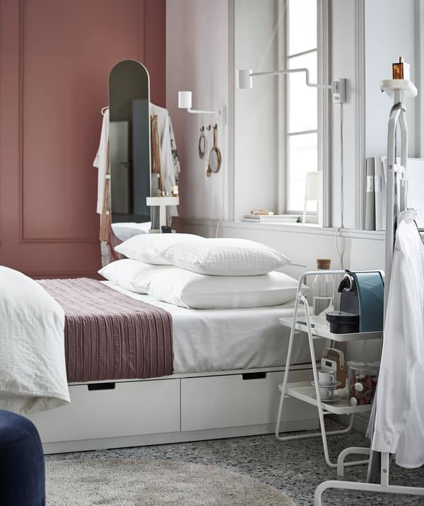 For those who like an ulta-organised bedroom, an IKEA NORDLI bed frame with built-in storage is the perfect match.