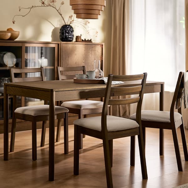 Four dark brown TONSTAD dining chairs with dark brown TONSTAD dining table.