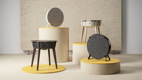 Four different air purifiers in various colors.