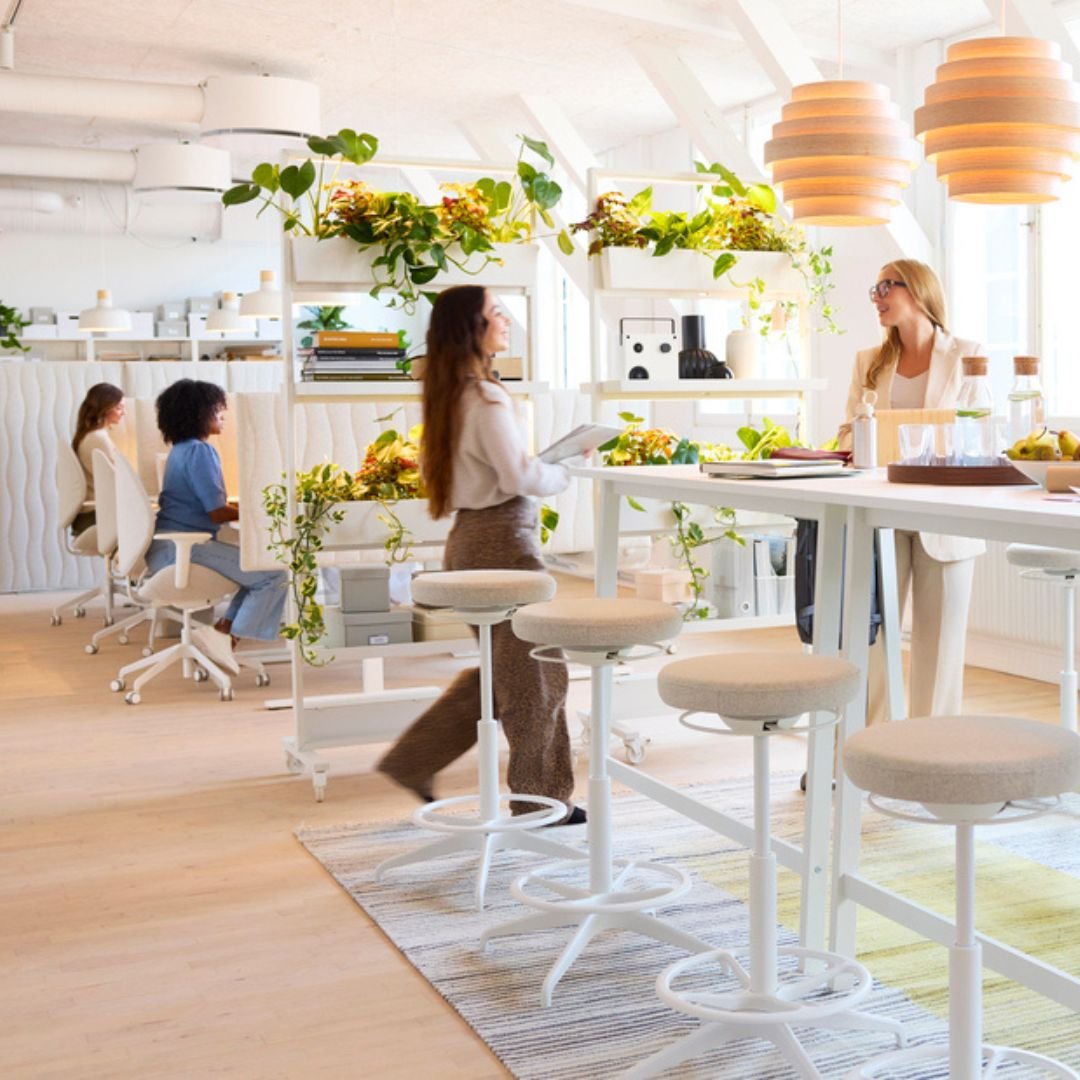 Four women work in an office designed by IKEA Business experts. 