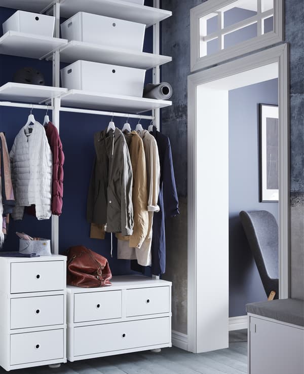 Free up space in a small hallway with hallway furniture from IKEA! IKEA offers a wide range of hallway furniture such as ELVARLI open storage unit. Add several boxes with lids and store away stuff you don’t use for a minimalist look.