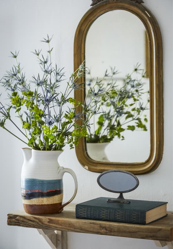 Fresh flowers displayed in a jug 