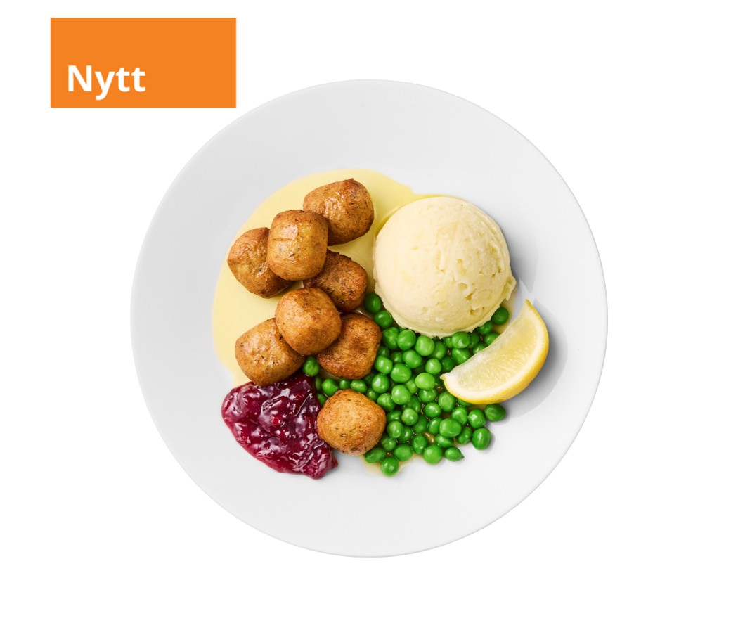 Friterade fiskbullar på en tallrik.