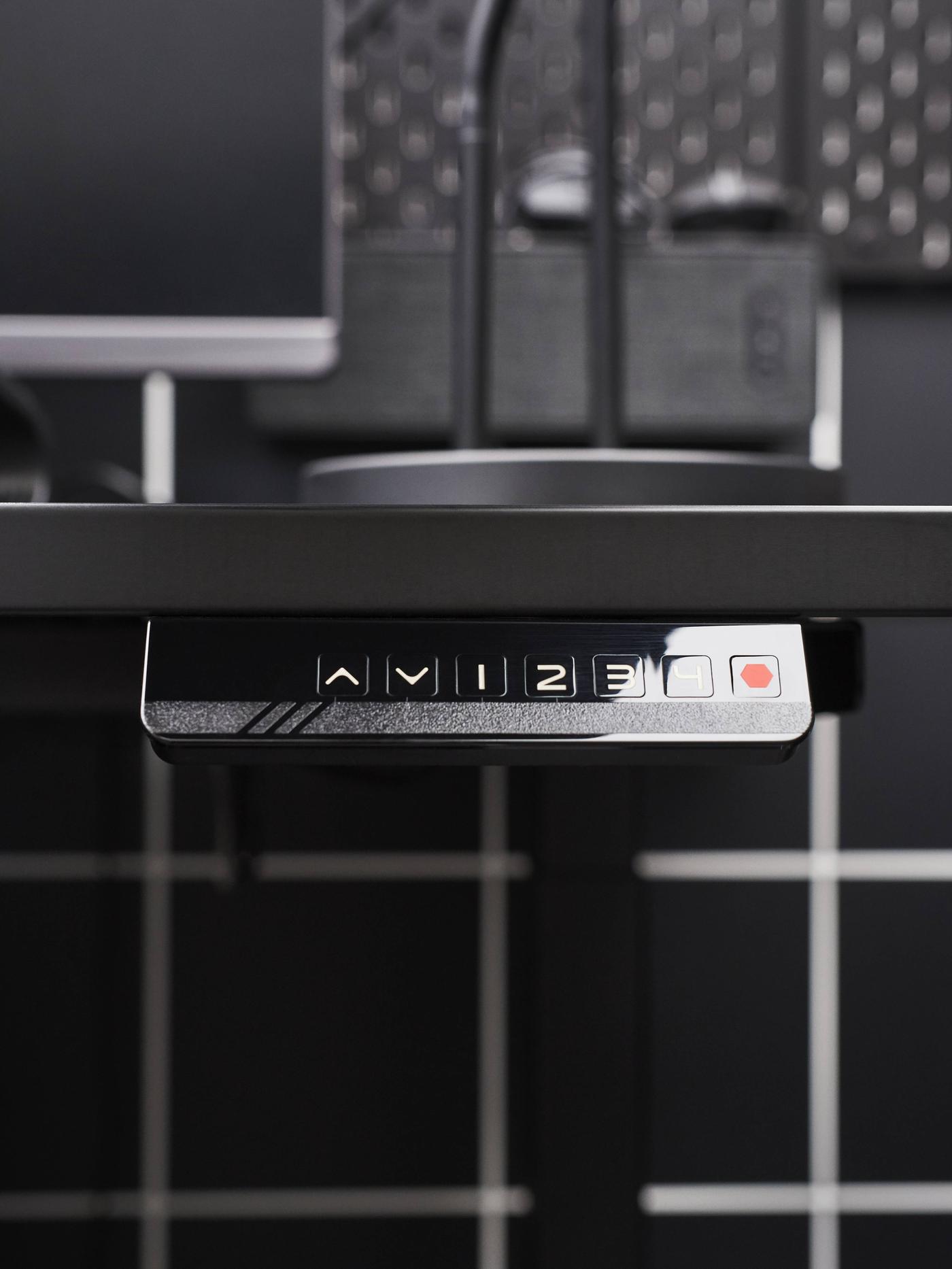 Gambar dekat bagi meja permainan UPPSPEL yang boleh dilaraskan ketinggian.