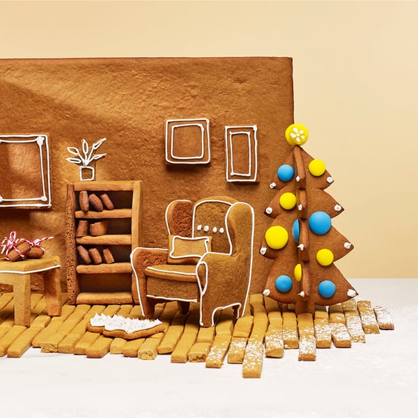 Gingerbread house interior being constructed