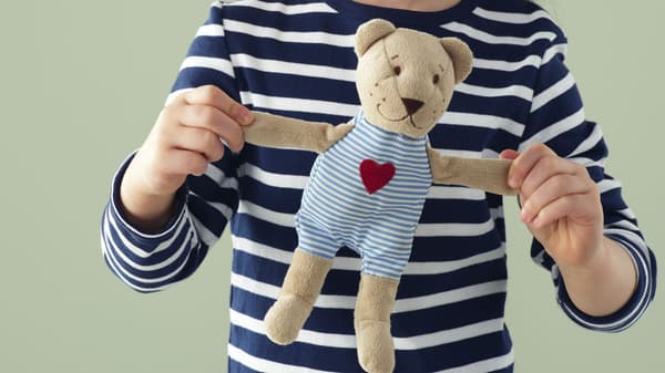 girl holding FABLAR BJORN